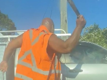 Man smashes car with machete in road rage incident. Picture: Channel 9