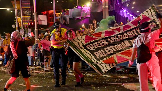 Pro-Palestine protesters were arrested by Police during the Mardi Gras celebrations through Oxford street. Picture: NCA NewsWire / Jeremy Piper