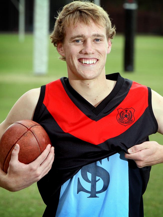 Jack Hombsch in his Rostrevor and Sturt guernseys in 2010. Picture: Sarah Reed