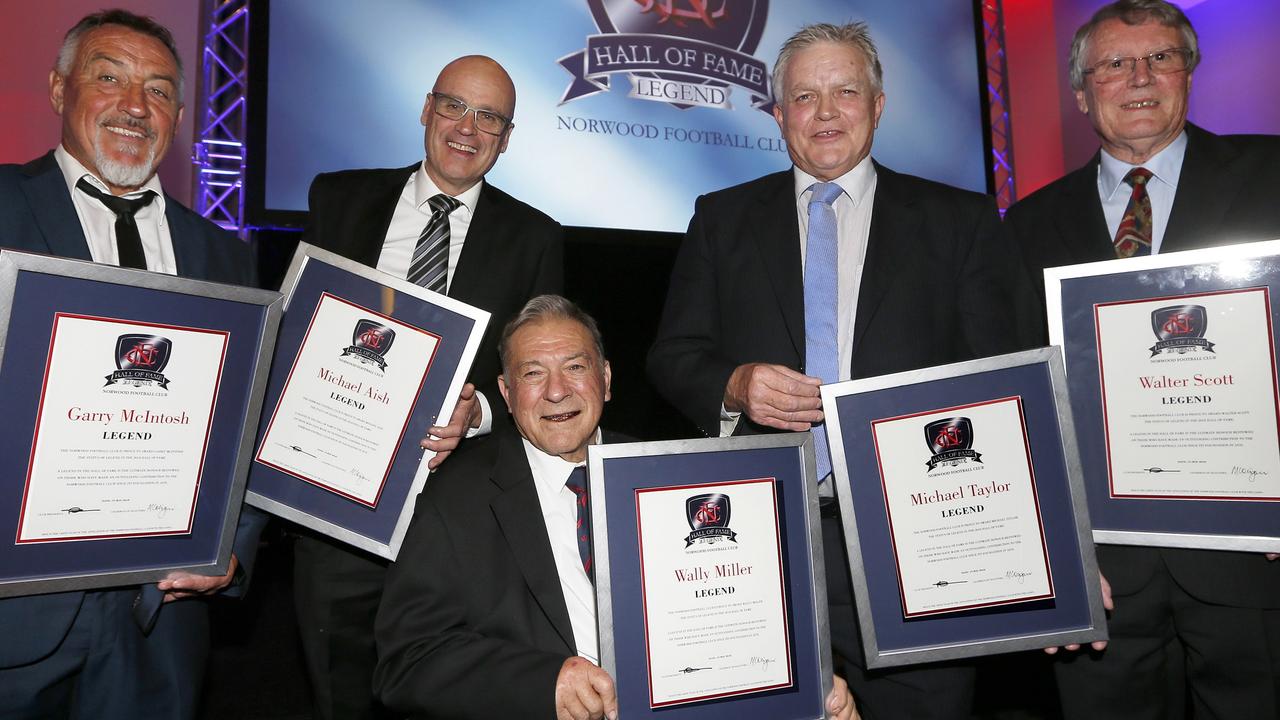 Wally Miller (middle) with fellow Norwood greats, from left, Garry McIntosh, Michael Aish and Michael Taylor, along with John Woodrow (grandson of Walter Scott), after they were awarded legend status at Norwood in 2018. Picture: Bryan Charlton