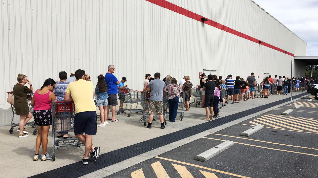 People lining up at Costco in North Lakes in Brisbane before opening. Picture: AAP Image/Attila Csaszar