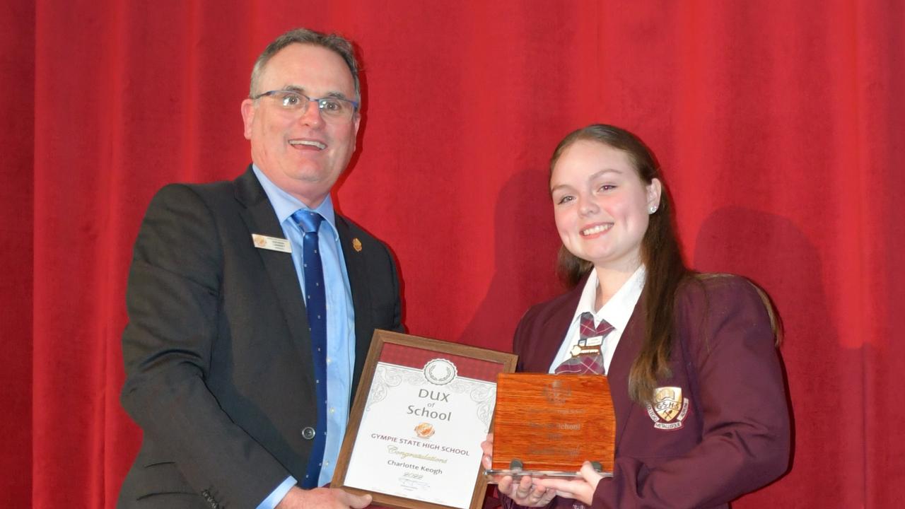 Gympie State High School principal Anthony Lanskey presents the Dux award to Charlotte Keogh. Picture: Supplied.