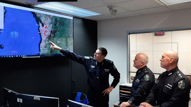 SAPOL Operations Inspector of Organised Crime Darren Fielke, SAPOL Assistant Commissioner Peter Harvey and SAPOL Crime Branch Chief, Superintendent Steve Taylor during ANOM raids. Picture: AFP/SAPOL