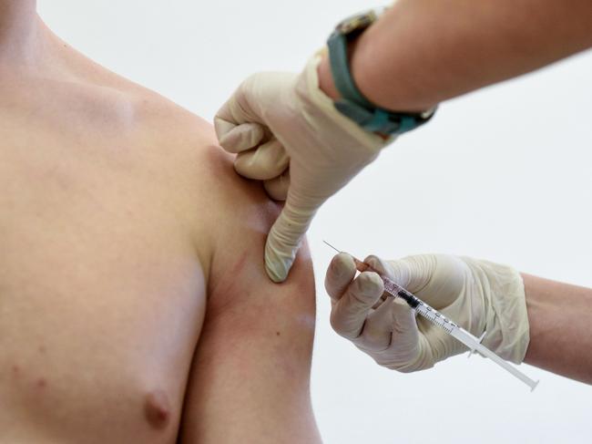 A nurse administers a measles vaccine. Picture Yuri Dyachyshyn, AFP