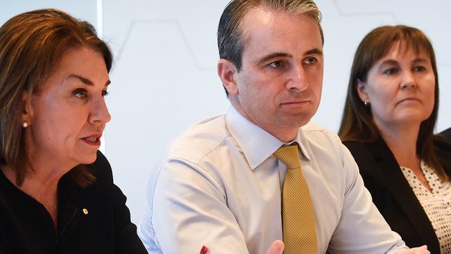 Commonwealth Bank of Australia CEO Matt Comyn (centre) with Australian Banking Association CEO Anna Bligh (left) and Bendigo and Adelaide Bank CEO Marnie Baker (right) during a meeting with Treasurer Josh Frydenberg at the start of March. Picture: AAP