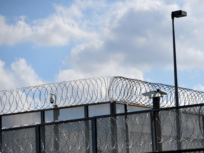 The perimeter fence at Silverwater jail in Sydney's west, Monday, April 1, 2013. Two prisoners have been found dead in a cell at Silverwater jail during an inspection early today. (AAP Image/Paul Miller) NO ARCHIVING