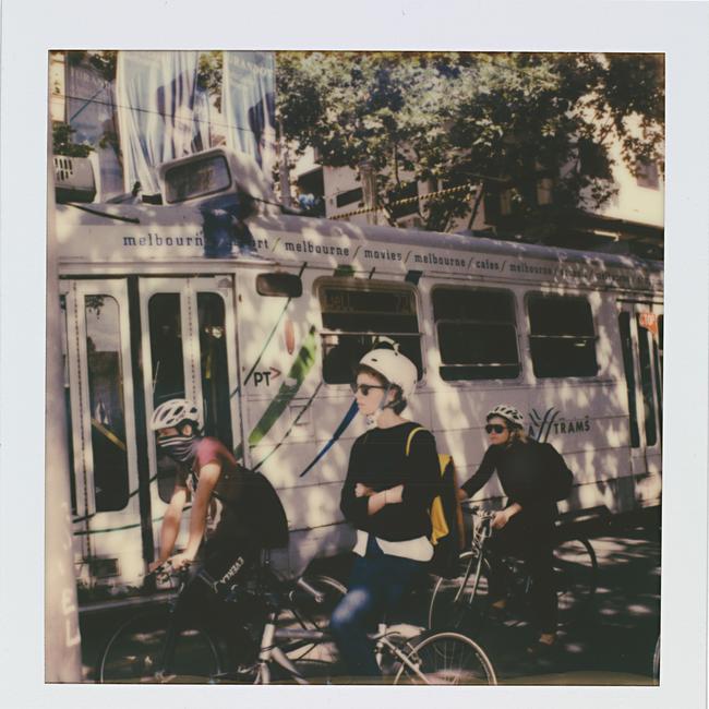 Cyclists in Swanston St. #polaroidoriginals Copyright: Maripol.