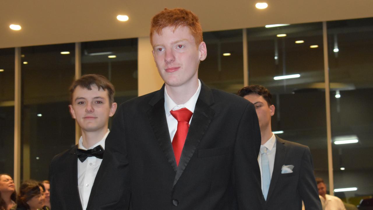 Maroochydore State High seniors walk into their 2022 formal.