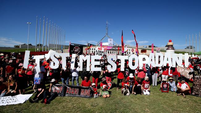 ‘It’s time to stop Adani’: protesters at Parliament House today. Photo: Kym Smith