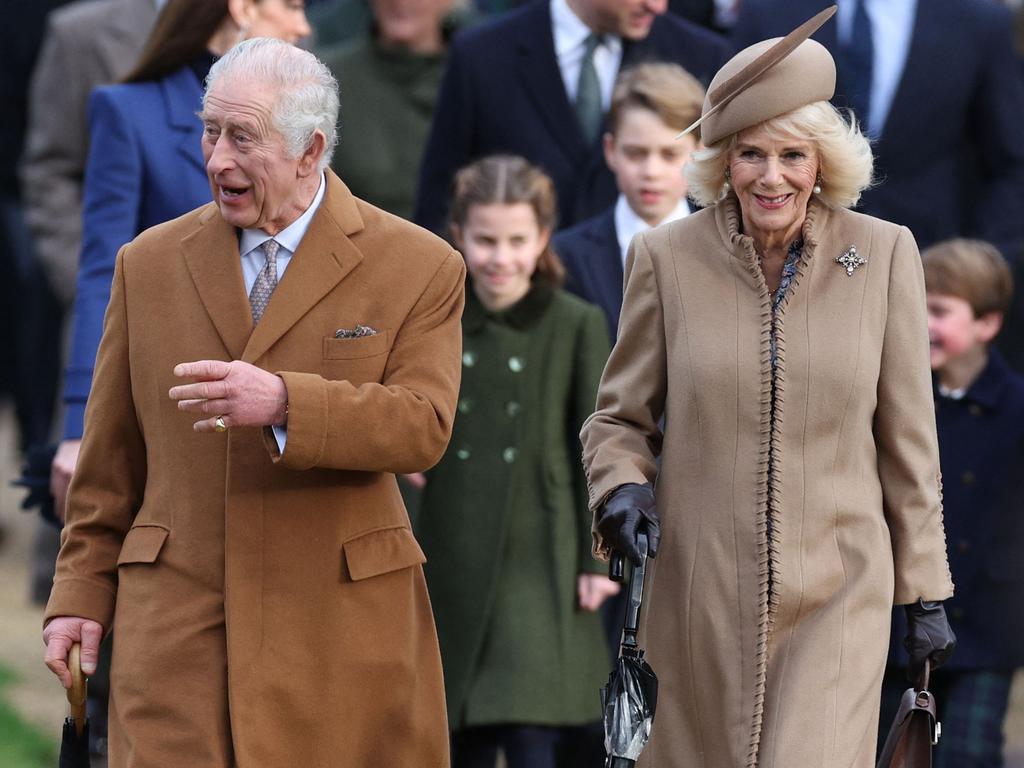 King Charles III (L) and Queen Camilla (R) arrive for the Royal Family's traditional Christmas Day service at St Mary Magdalene Church in Sandringham. Picture: AFP