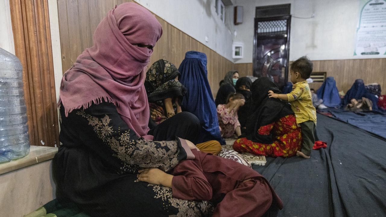 Displaced Afghan women and children from Kunduz are seen sheltering at a mosque. Picture: Getty