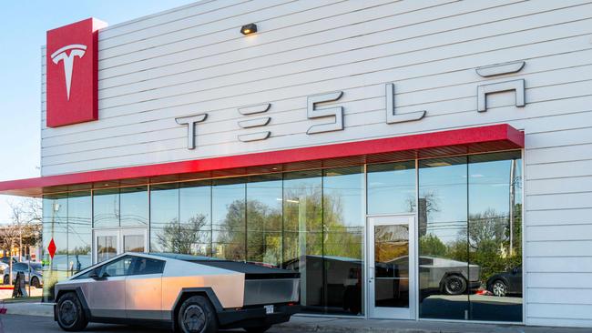 AUSTIN, TEXAS - MARCH 20: A Tesla Cybertruck is parked in front of a dealership on March 20, 2025 in Austin, Texas. Tesla is recalling more than 46,000 Cybertrucks after the National Highway Traffic Safety Administration has reported that a cosmetic component along the vehicle's exterior can potentially detach, creating road hazards for motorists.   Brandon Bell/Getty Images/AFP (Photo by Brandon Bell / GETTY IMAGES NORTH AMERICA / Getty Images via AFP)