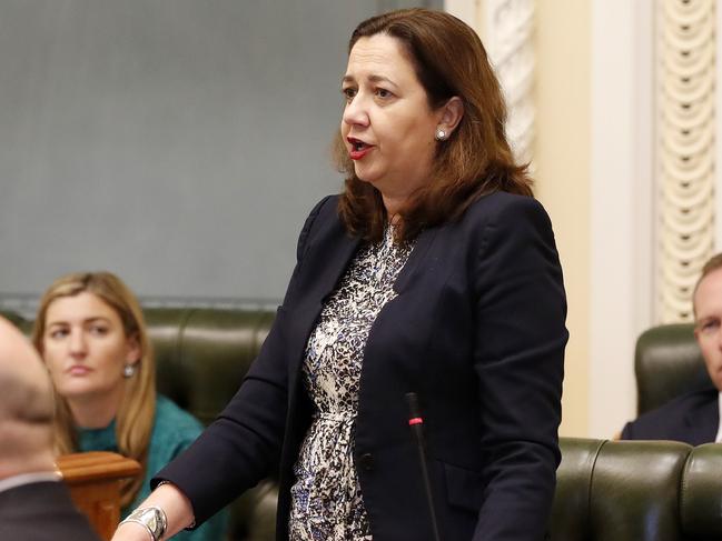 Premier Anna Palaszczuk pictured during Question Time at the Queensland Parliament, Brisbane 17th of March 2020.    Ministers are sitting one seat apart due to the spread of Coronavirus (Covid 19).  (AAP Image/Josh Woning)