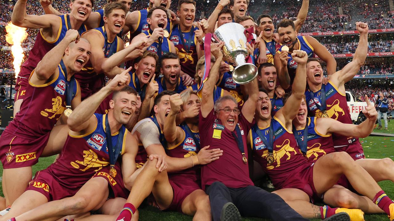 Brisbane Lions players celebrate winning the AFL grand final. Picture Lachie Millard