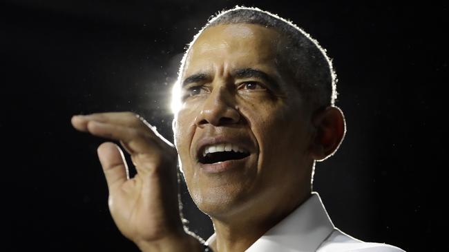 FILE - In this Nov. 2, 2018, file photo, former President Barack Obama speaks during a campaign rally for Democratic candidates in Miami. Nearly eight years after he was last on the ballot, Obama is emerging as a central figure in the 2020 presidential election. Democrats are eagerly embracing Obama as a political wingman for Joe Biden, who spent two terms by his side as vice president. Obama remains the partyâ€™s most popular figure, particularly with black voters and younger Democrats. (AP Photo/Lynne Sladky, File)