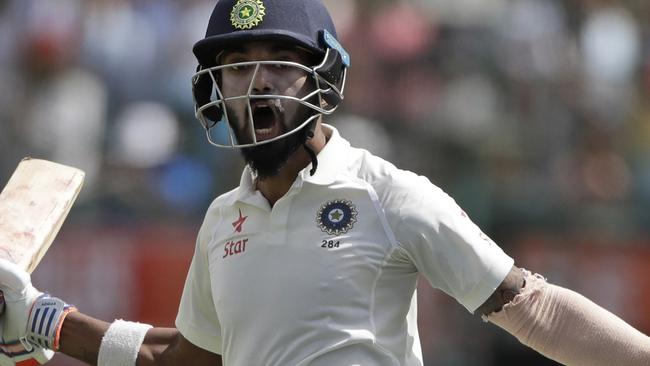 India's Lokesh Rahul celebrates after winning their fourth test cricket match against Australia in Dharmsala, India, Tuesday, March 28, 2017. India won the Border-Gavaskar trophy and the series. (AP Photo/Tsering Topgyal)
