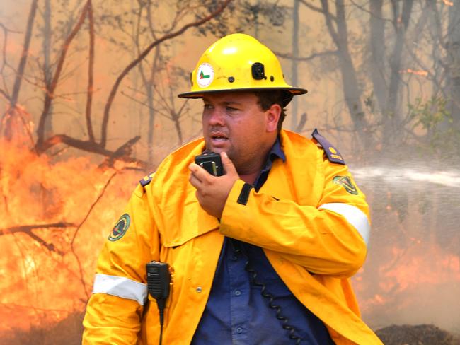 Emergency crews battle the fire at Peregian Springs. Photo: John McCutcheon / Sunshine Coast Daily