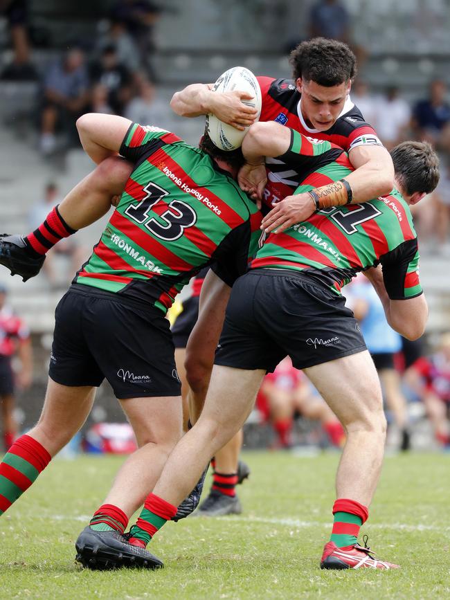 North Sydney Bears Lachlan Mears-Crabbe is stopped in a strong Rabbitohs tackle in the SG Ball Cup clash at Redfern Oval. Picture: Sam Ruttyn