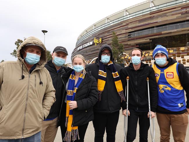 West Coast Eagles supporters who arrived at Optus Stadium on Sunday before the announcement that there would be no spectators due to Covid-19 restrictions. Picture: Paul Kane / Getty Images