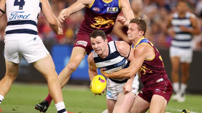 Dangerfield throws the ball to Gary Ablett who kicks a goal in the crucial third term against Brisbane in the preliminary final.