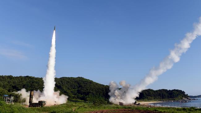 South Korea's Hyunmu-2 Missile System and the US M270 Multiple Launch Rocket System fire missiles off South Korea's east coast during a joint drill aimed to counter North Korea’s missile test. Picture: AFP/South Korean Defence Ministry