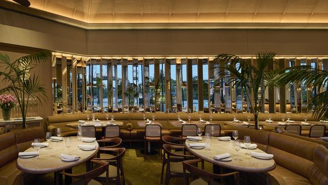 A wall of mirrors reflects the Brisbane River view at Supernormal in the CBD.