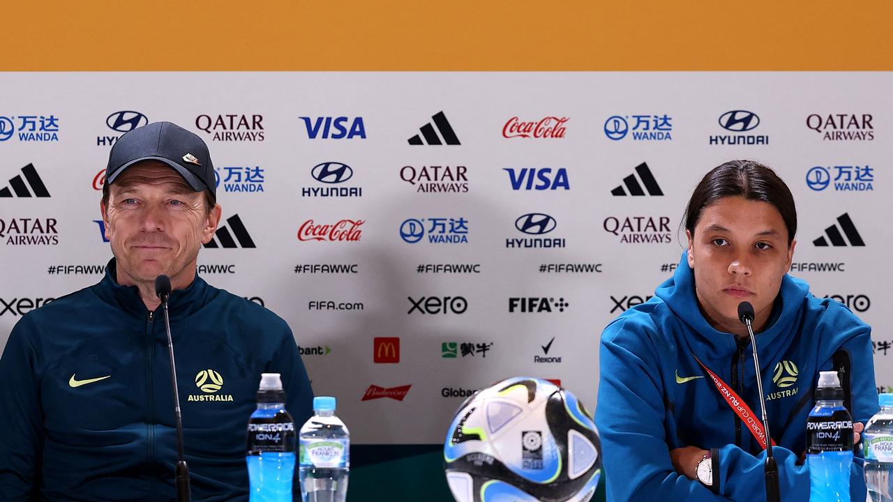 Australian women's football coach Tony Gustavsson (L) and Australia's forward Sam Kerr take part in a press conference at Stadium Australia in Sydney on July 19, 2023, on the eve of the Women's World Cup football match between Australia and Ireland. (Photo by FRANCK FIFE / AFP)