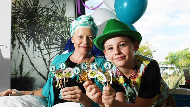 Ovarian cancer patient Stacee Barnes with Angus Copelin-Waters and his Croc candy in July,2019. Picture: Katrina Bridgeford.