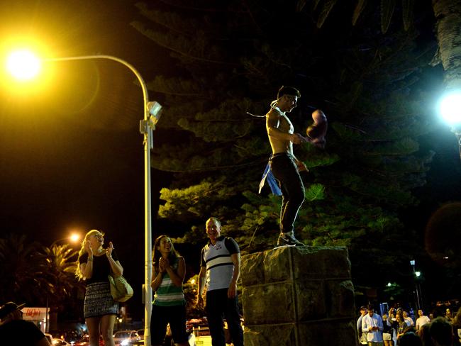 A fan gets into the party mood in Cronulla last night . Picture: Jeremy Piper