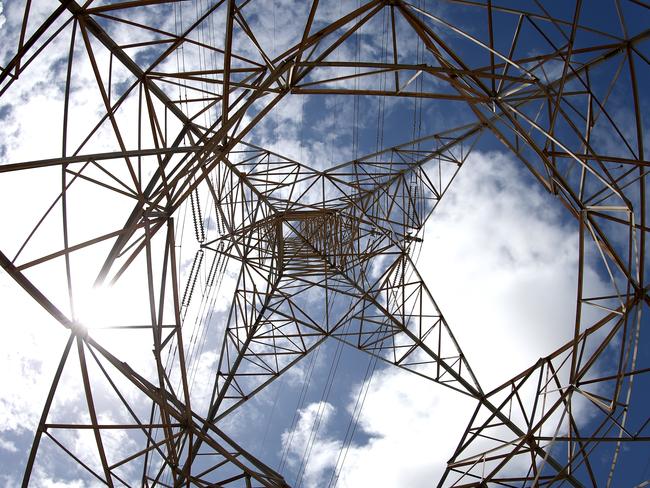 Power lines at the AGL Power Station at Torrens Island in Adelaide, Monday, November 4, 2019.  (AAP Image/Kelly Barnes) NO ARCHIVING