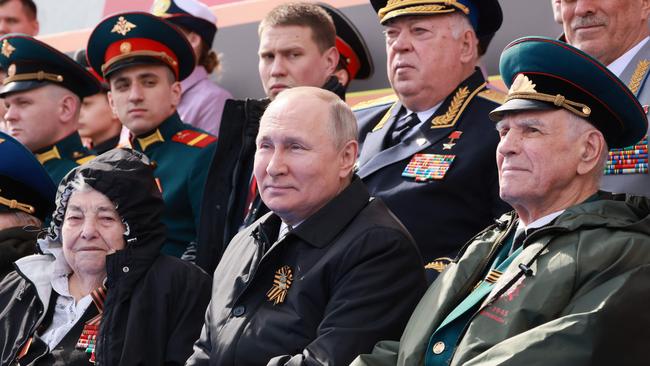 Russian President Vladimir Putin watches the Victory Day military parade at Red Square. Picture: Mikhail metzel / Sputnik / AFP