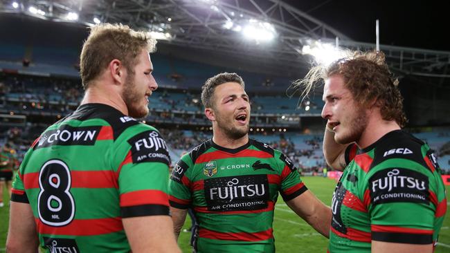 Souths Sam Burgess with his brothers Tom and George after victory in the South Sydney v St. George-Illawarra NRL Semi Final at ANZ Stadium, Homebush. Picture: Brett Costello