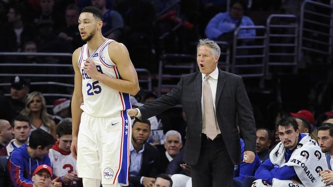 Philadelphia 76ers head coach Brett Brown, center right, talks to Ben Simmons.