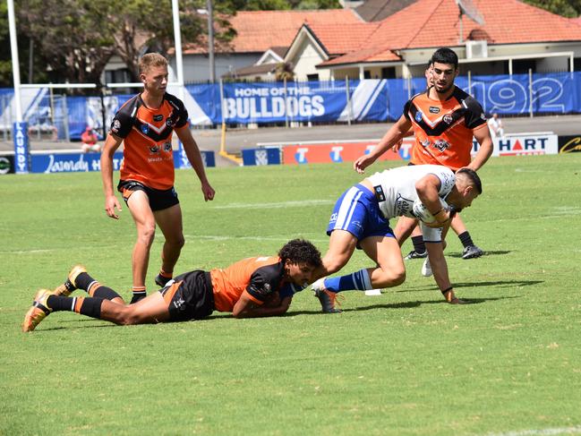 Brenden Naicori tackles Michael Gabrael. Picture: Sean Teuma/NewsLocal