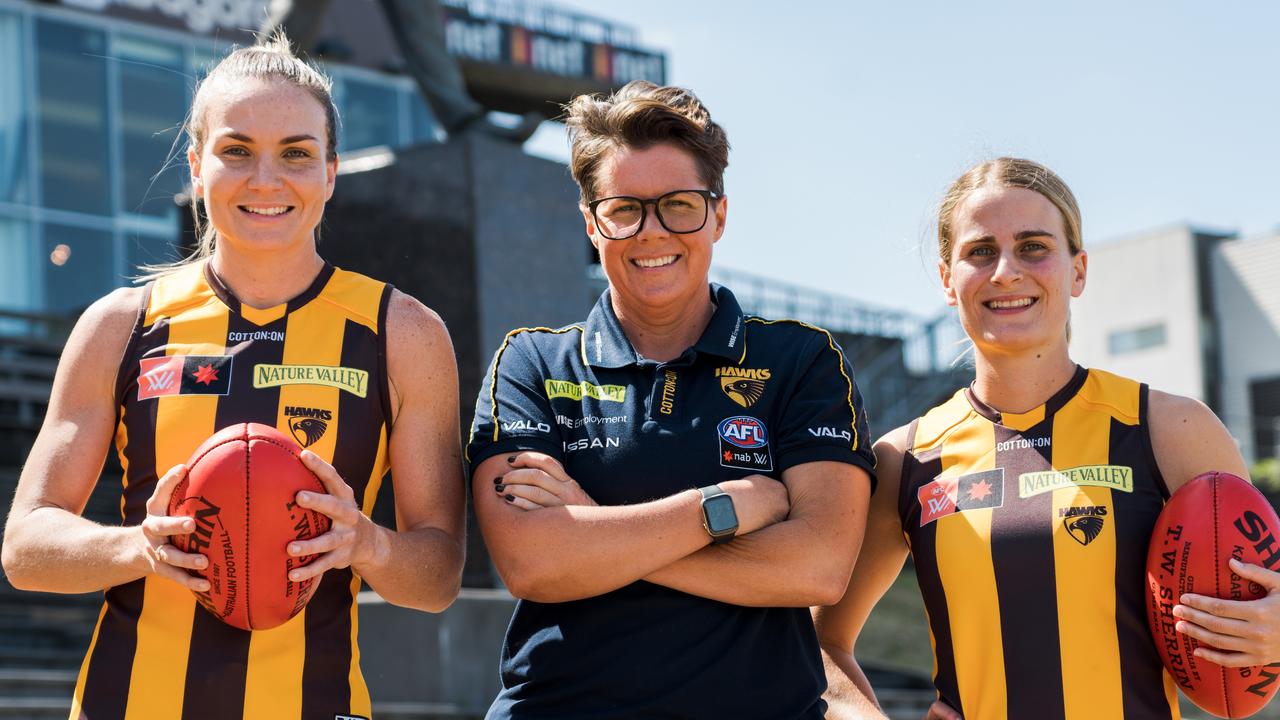 Hawthorn coach Bec Goddard (centre) said Brisbane stars Emily Bates (left) and Greta Bodey had defected to the Hawks to help expand the competition. Picture: Hawthorn FC