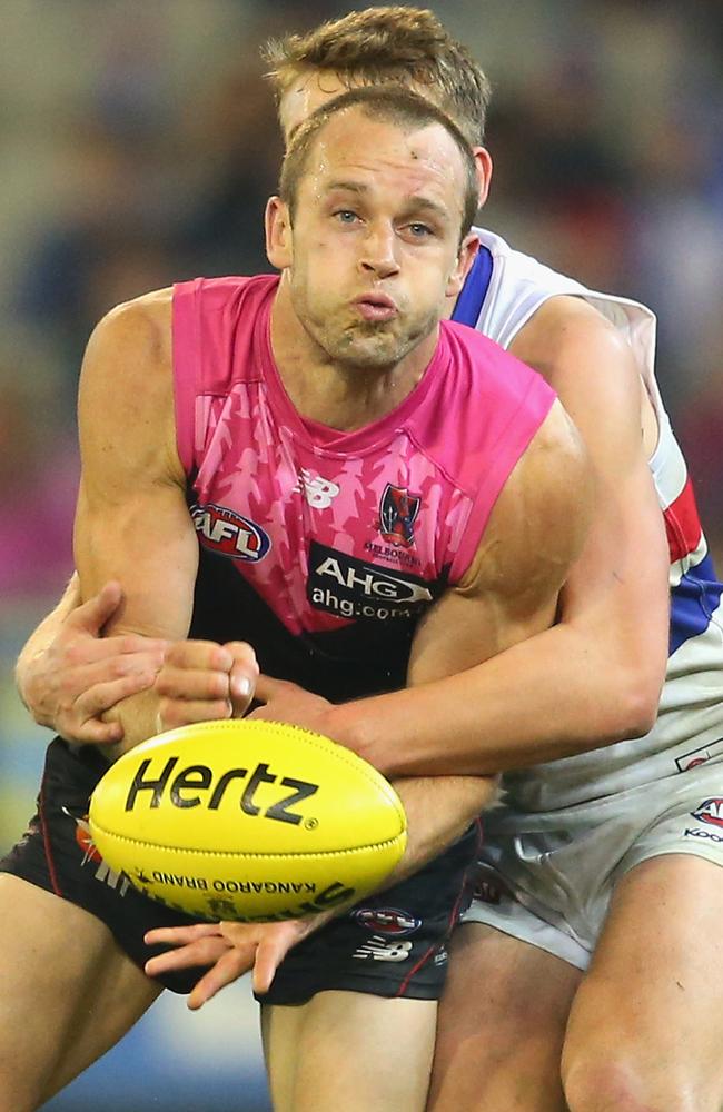 Demon Daniel Cross leads Jackson Macrae to the ball. Picture: Getty