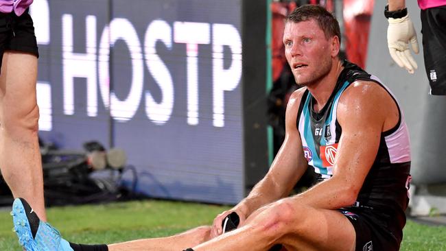 Ebert limped off with a knee injury at three-quarter-time. Picture: AAP Image/Darren England.