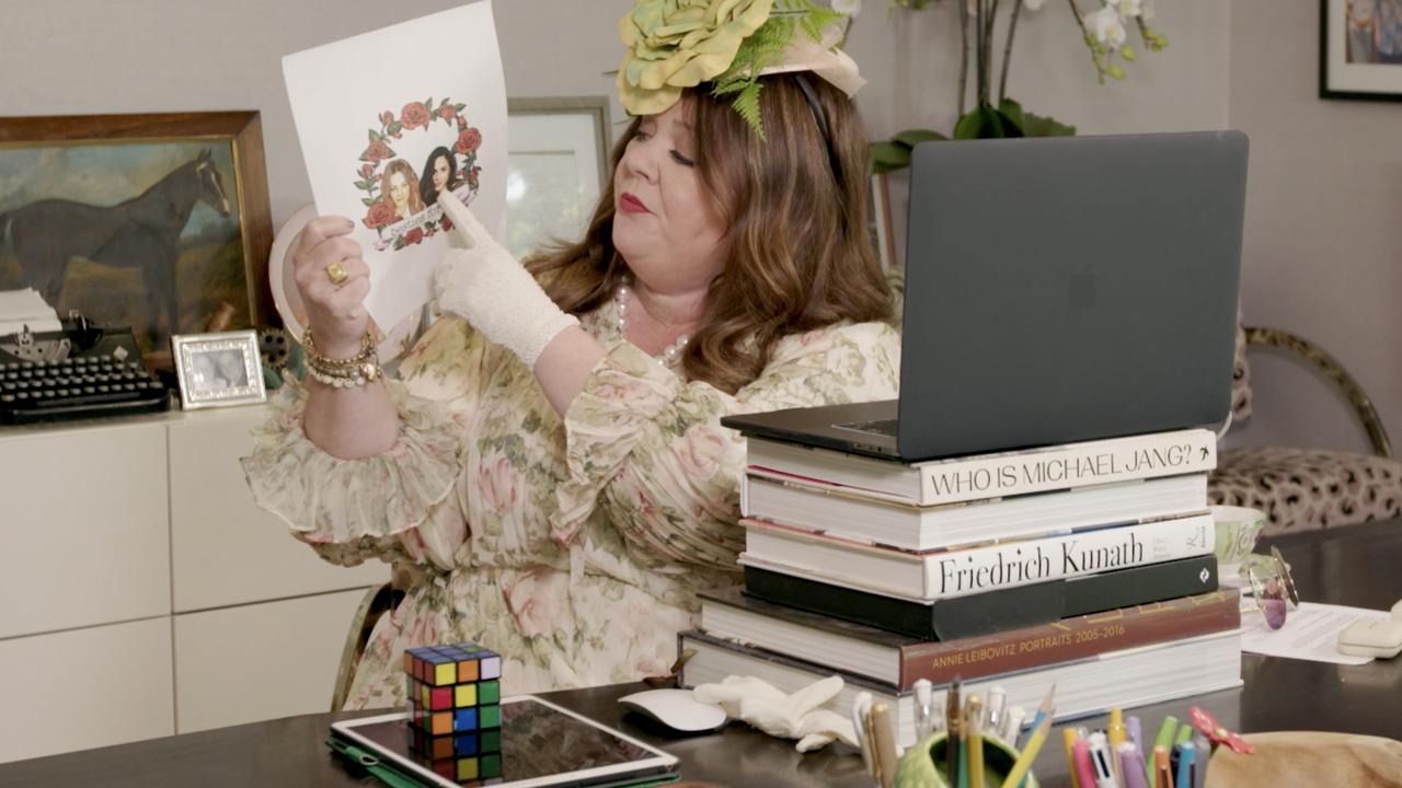 Melissa McCarthy holds up a drawing of herself and Meghan and suggest they get matching tattoos.