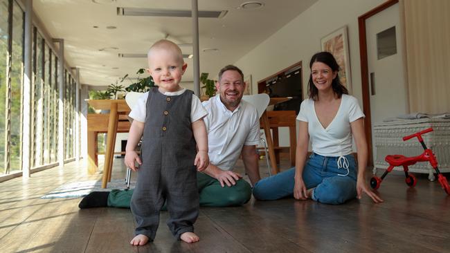 Brian Geraghty, with his son, Otis, 15 months, and partner Victoria Zwierzynski. Picture: Justin Lloyd