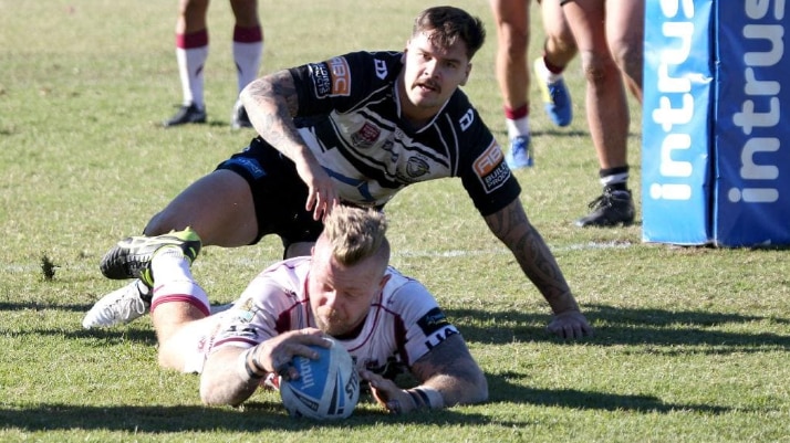 Luke Page scores a try. Picture: Mike Batterham