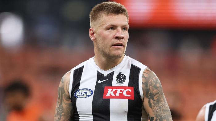 SYDNEY, AUSTRALIA - MARCH 09:  Jordan De Goey of the Magpies and team mates look dejected after the AFL Opening Round match between Greater Western Sydney Giants and Collingwood Magpies at ENGIE Stadium, on March 09, 2024, in Sydney, Australia. (Photo by Matt King/AFL Photos/via Getty Images )