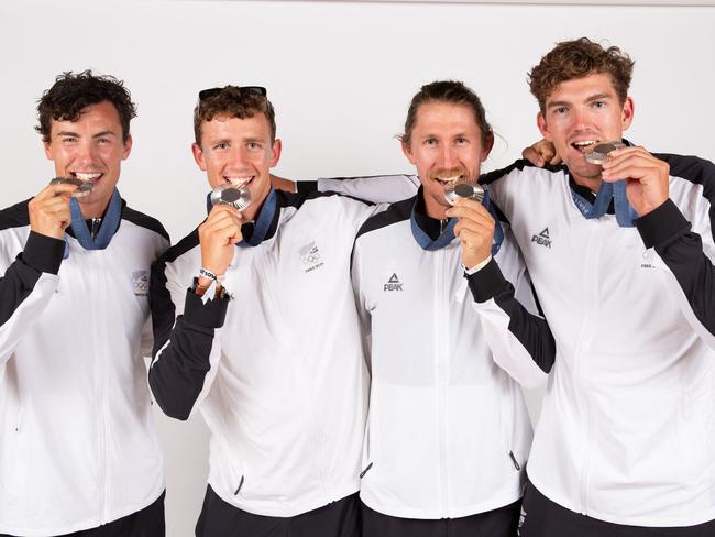 New Zealand's men's four rowing silver medallists Ollie Maclean, Logan Ullrich, Tom Murray and Matt Macdonald pose for a portrait during a photo session at the Champions Park at the Trocadero in Paris. Picture: THIBAUD MORITZ