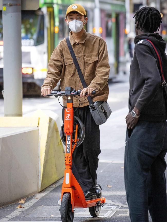 A man rides a rental e-scooter. Picture: Mark Stewart