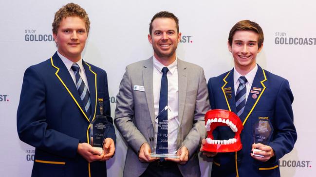 Bradley Cox and Caleb Yates with Emmanuel Collège Dean of Faculty Eli Shambrook at the Mayor’s Technology and Innovation Awards. Picture: Supplied