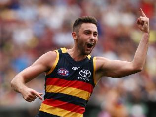 ADELAIDE, AUSTRALIA - MARCH 26:  Rory Atkins of the Crows celebrates after kicking a goal during the round one AFL match between the Adelaide Crows and the GWS Giants at Adelaide Oval on March 26, 2017 in Adelaide, Australia.  (Photo by Morne de Klerk/Getty Images)