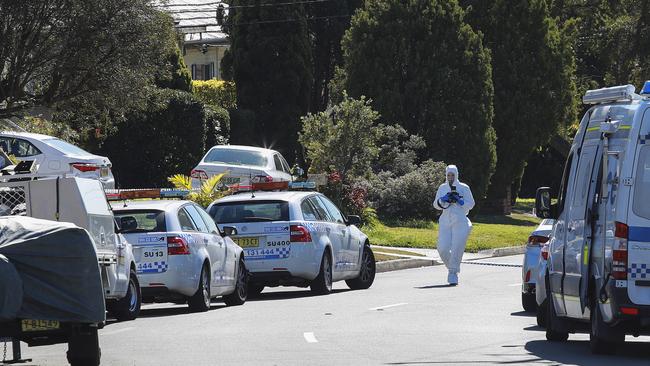 Police have established a crime scene at the home where two people were found dead. Picture: Justin Lloyd