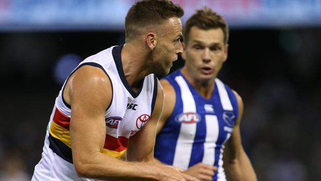 Brodie Smith was caught by Todd Goldstein late in Saturday’s game. Picture: Hamish Blair (AAP).