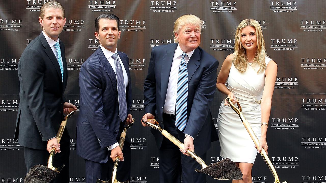 Eric Trump, Donald Trump Jr and Ivanka Trump (above with their father at Trump International Hotel) were directors of the defunct Trump Foundation. Picture: Paul Morigi/WireImage