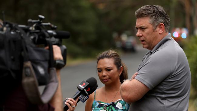 Neil and Laura Bentham talk to media while they wait for their son, who was swimming with the boy who went missing. Picture: NCA NewsWire / Damian Shaw