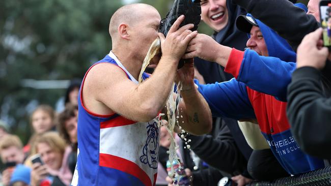 Shane Harvey celebrates his fifth goal with a shoey. Picture: Hamish Blair